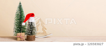Christmas composition. Gifts, small tree, branches and craft DIY decorations on white background. New year concept. Christmas home decoration Flat lay, top view, copy space Christmas composition. Gifts, small tree, branches and craft DIY decorations on white background. New year concept. Christmas home decoration Flat lay, top view, copy space 120383827