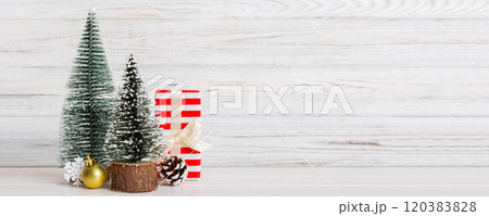 Christmas composition. craft Gift box, small tree, branches and craft DIY decorations on white background. New year concept. Christmas home decoration Flat lay, top view, copy space 120383828