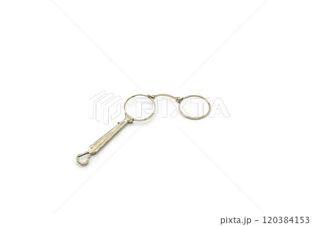 Old vintage lorgnette from the middle of the nineteenth century on the white background Old vintage lorgnette from the middle of the nineteenth century on the white background 120384153