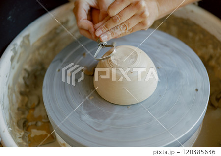 Artisan Pottery Work on a Creative and Inspiring Wheel of Artistic Exploration and Design 120385636