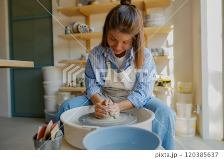 The Detailed Pottery Creation Process Takes Place in a Bright and Inspiring Studio Space The Detailed Pottery Creation Process Takes Place in a Bright and Inspiring Studio Space 120385637