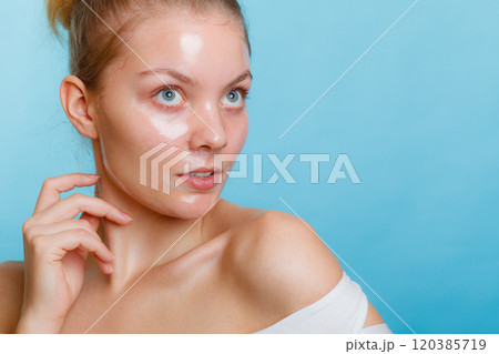 Woman in facial peel off mask. Woman in facial peel off mask. 120385719