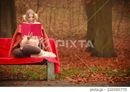 Young lady with literature. 120385770