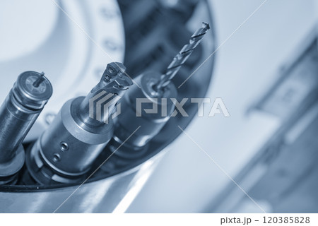The indexable tool in the tool magazine of machining center in the light blue scene. The indexable tool in the tool magazine of machining center in the light blue scene. 120385828