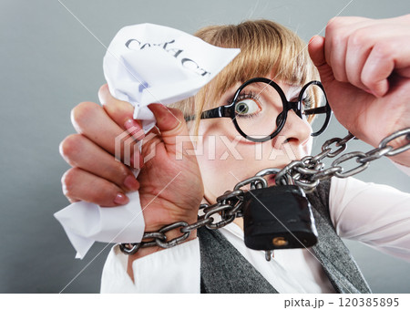 Furious woman with chained hands and contract Furious woman with chained hands and contract 120385895