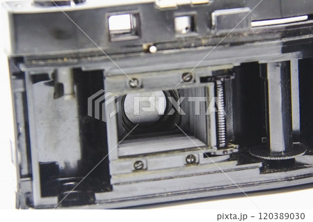 Vintage old photo camera from inside on the white background 120389030