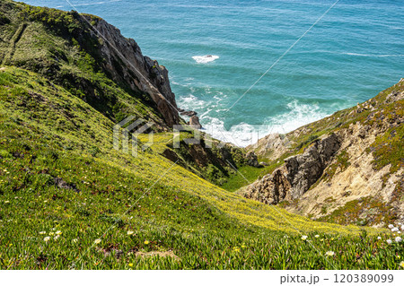 Hiking on the rocky cliffs of Cabo da Roca at the Atlantic coast of Portugal, Europe Hiking on the rocky cliffs of Cabo da Roca at the Atlantic coast of Portugal, Europe 120389099