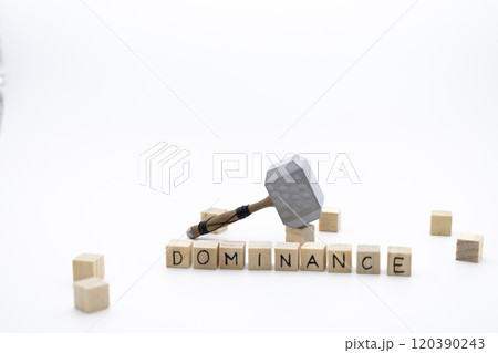 The wooden cubes with the word DOMINANCE and the weapon around against white background. The medieval hammer on a wooden cube. The wooden cubes with the word DOMINANCE and the weapon around against white background. The medieval hammer on a wooden cube. 120390243