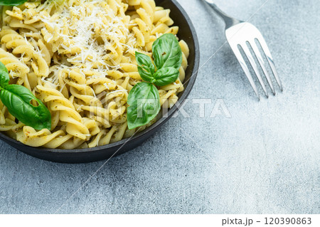 Pasta with basil sauce pesto . Italian food photography . Top view Pasta with basil sauce pesto . Italian food photography . Top view 120390863