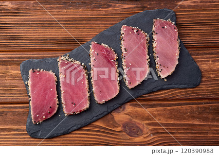 Sliced tuna steak with sesame photography . Top view Sliced tuna steak with sesame photography . Top view 120390988