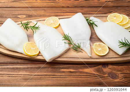 Squid tube and ring photography . Seafood top view 120391044