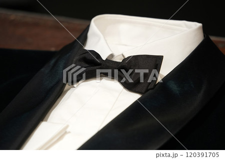 formal man dress white shirt and black bow tie detail 120391705