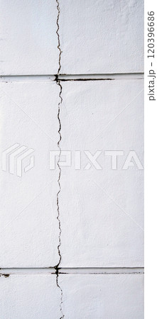 Vertical cracks in the surface of a concrete pole. 120396686