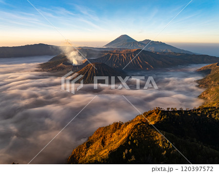 Aerial view Mountains at Bromo volcano during sunrise sky,Beautiful Mountains Penanjakan in Bromo Tengger Semeru National Park,East Java,Indonesia.Nature landscape background 120397572