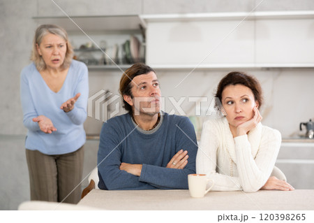 Elderly woman swears at married couple 120398265