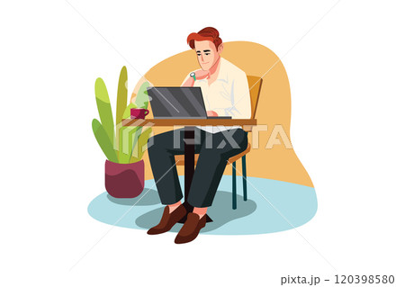 A man sitting at a cafe working on a laptop 120398580