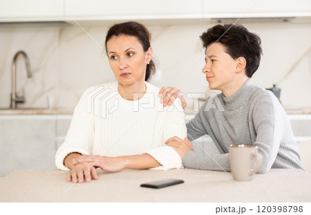 Boy asking mother for forgiveness 120398798