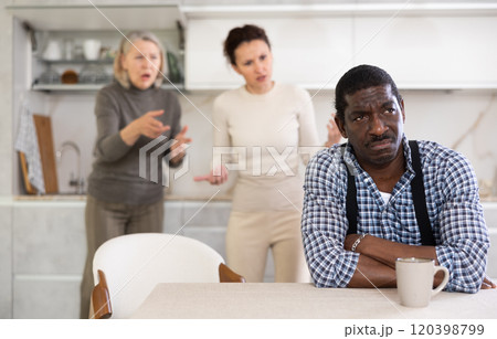 Man is tired of screams and swearing of his wife and mother-in-law Man is tired of screams and swearing of his wife and mother-in-law 120398799