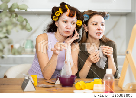 Adult and young women use face masks 120398800