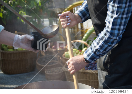 Outdoor Cooking at a Market Outdoor Cooking at a Market 120399424