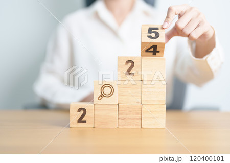 2024 year change to 2025 year block with magnifying glass icon. SEO, Search Engine Optimization, hiring , Advertising, Idea, Strategy, marketing, Keyword, Content and New Year start concepts 120400101