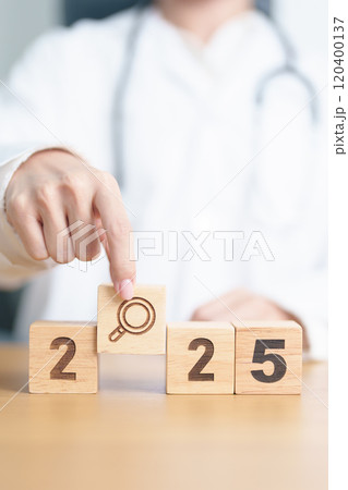 Happy New Year 2025 with Smile block against doctor. Health, Healthcare insurance, medical Satisfaction, feedback, Review, mental health, wellbeing, wellness and good year concept 120400137