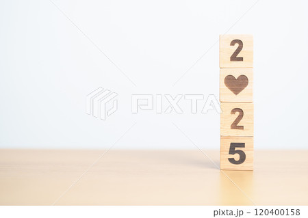 Happy New Year 2025 with heart block for health care, love, organ donation, resolution, charity, happy family, wellbeing and insurance concepts 120400158