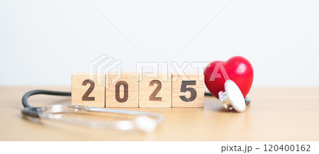 Happy New Year 2025 with Stethoscope of doctor and heart shape on table. health care, Insurance, Wellness and medical concept Happy New Year 2025 with Stethoscope of doctor and heart shape on table. health care, Insurance, Wellness and medical concept 120400162
