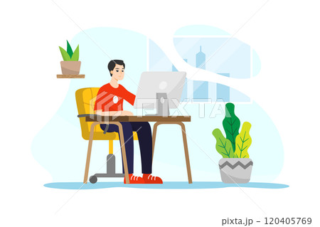 A man sitting in front of a computer working from home during quarantine time 120405769