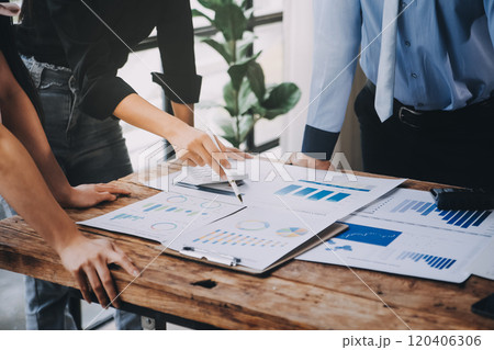 Fund managers team consultation and discuss about analysis Investment stock market at office 120406306