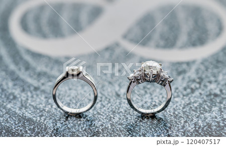 Closeup wedding diamond rings for him and her Closeup wedding diamond rings for him and her 120407517