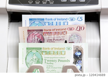 Irish pound in the counting machine 120414889