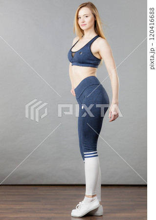 Woman wearing sporty workout outfit Woman wearing sporty workout outfit 120416688