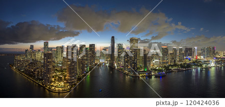 Aerial view of downtown district of of Miami Brickell in Florida, USA. Brightly illuminated high skyscraper buildings in modern American midtown 120424036