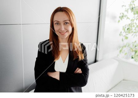 Confident Professional Woman in Modern Office 120425173