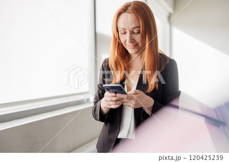 Professional Woman Using Smartphone Professional Woman Using Smartphone 120425239