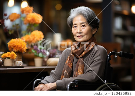 An elderly woman with a facial expression that signifies her understanding and acceptance of her old age. 120426982