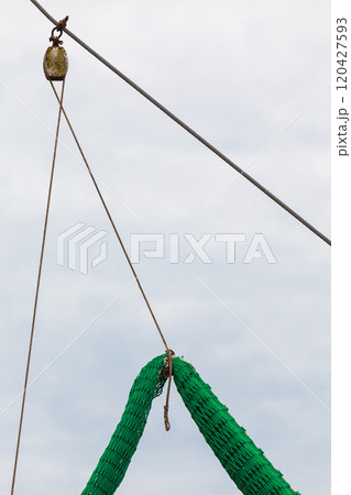 Yachting, many ropes and fishing nets on sailing boat. Yachting, many ropes and fishing nets on sailing boat. 120427593