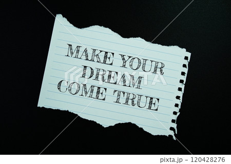 Make Your Dream Come True text on paper torn top view on black background, motivational inspirational concept 120428276