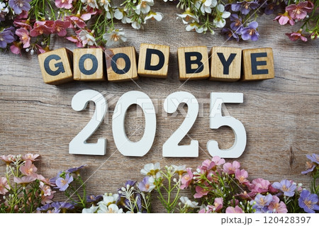 Goodbye 2025 years number with flowers frame top view on wooden background 120428397