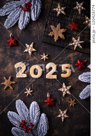 Festive New Year cookies in shape of 2025 Festive New Year cookies in shape of 2025 120428774