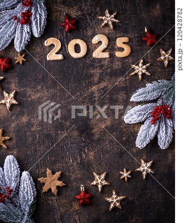 Festive New Year cookies in shape of 2025 120428782