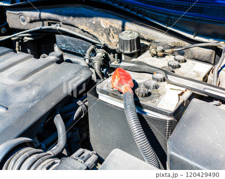 old battery car terminal in engine room 120429490