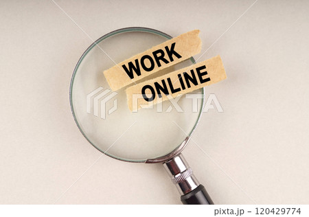On the magnifying glass are paper strips with the inscription - Work Online 120429774