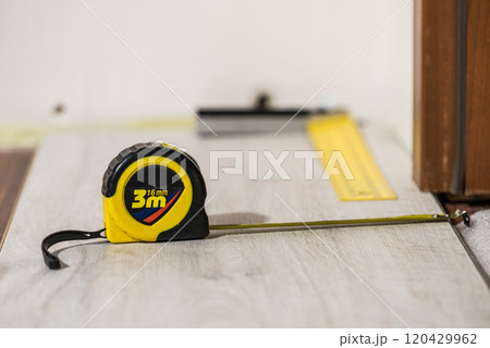 Renovations tools, tape measure, industrial ruler 120429962