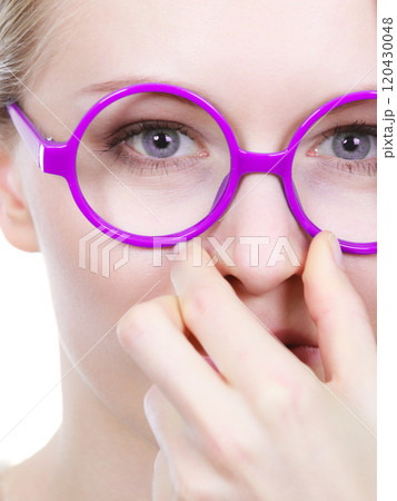 Nerdy woman holding nose smelling bad scent Nerdy woman holding nose smelling bad scent 120430048