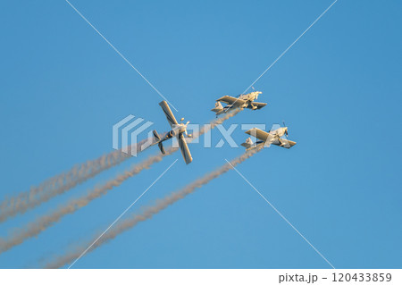 Stunt aerobatic planes performing stunts in air 120433859