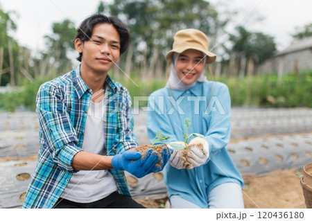 Young Adults Actively Engaging in Sustainable Gardening and Farming Practices 120436180