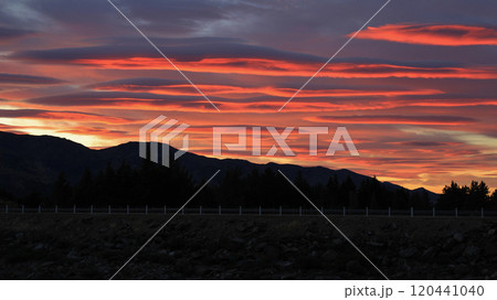Colorful sunrise in Hawea, New Zealand. 120441040