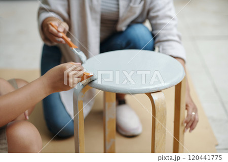 Painting Wooden Stool with White Glossy Paint 120441775